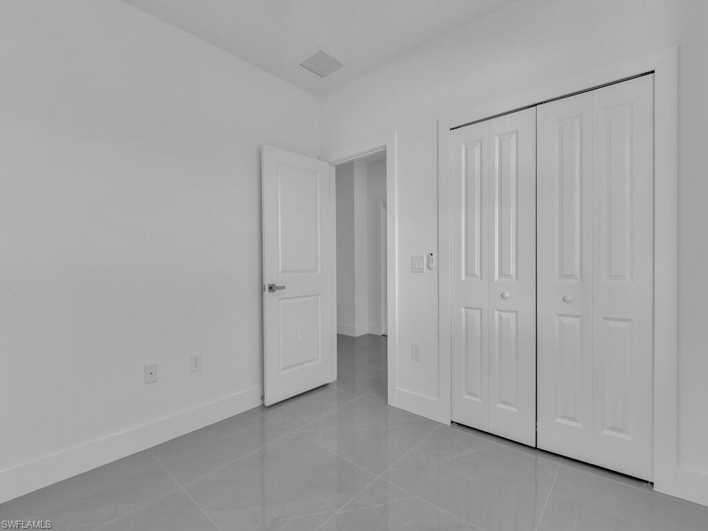 2212-2214 Wilson Road Lehigh Acres, FL 33973 - Photo 20 of 49 a view of an empty room