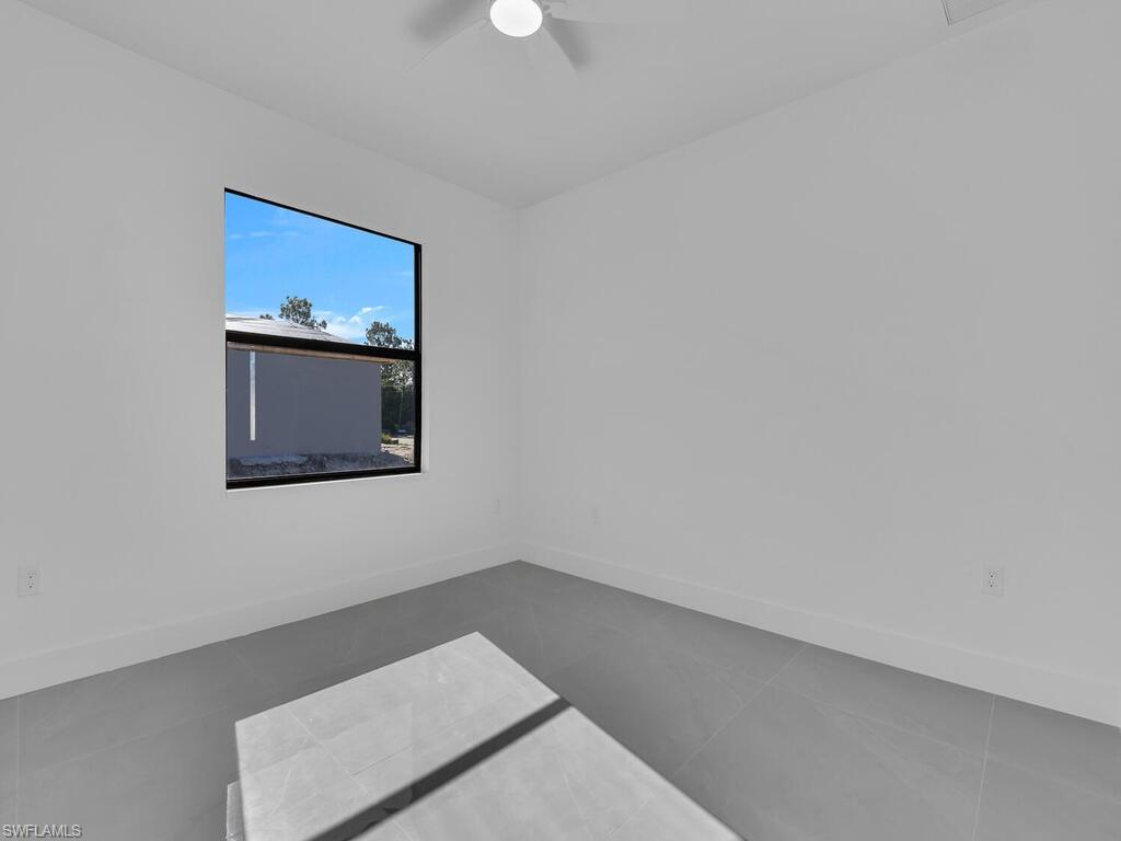 2212-2214 Wilson Road Lehigh Acres, FL 33973 - Photo 23 of 49 a view of an empty room