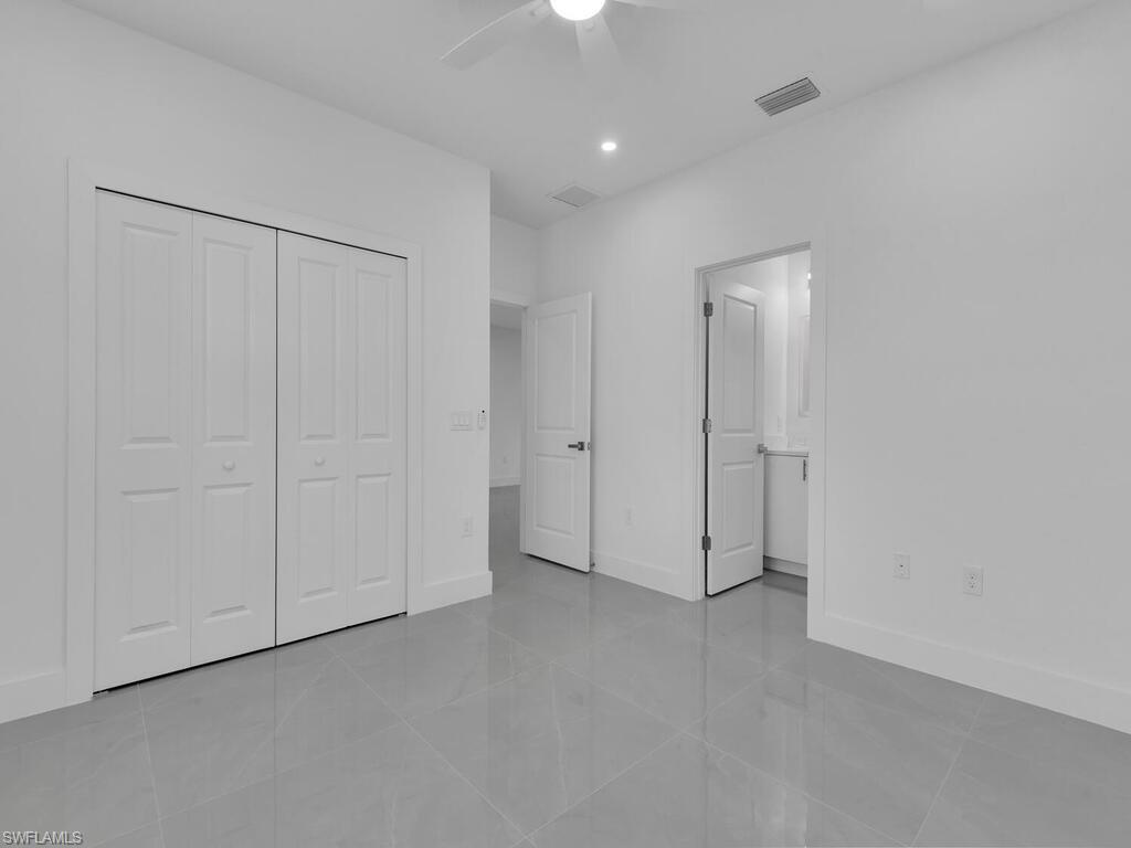 2212-2214 Wilson Road Lehigh Acres, FL 33973 - Photo 40 of 49 a view of an empty room