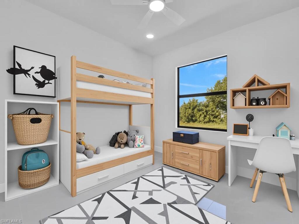 2212-2214 Wilson Road Lehigh Acres, FL 33973 - Photo 46 of 49 a living room with furniture and a flat screen tv