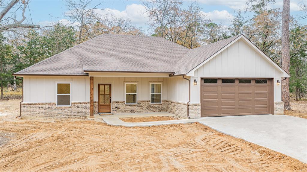 711 King Charles Road Scroggins, TX 75480 - Photo 2 of 39 a view of house with yard and sitting area