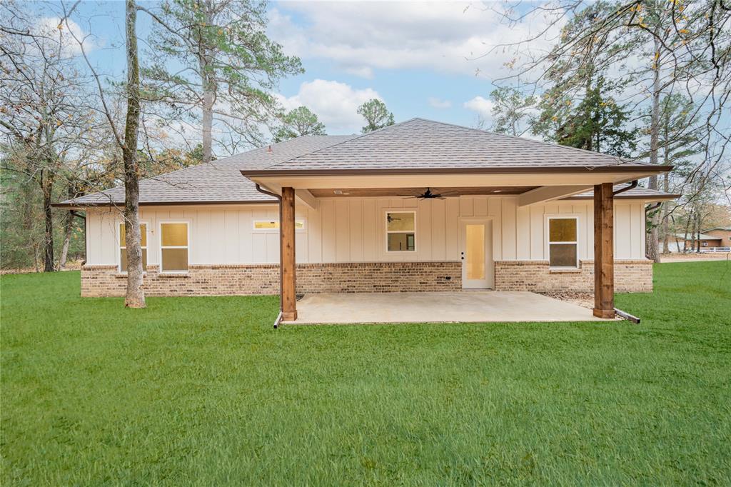 711 King Charles Road Scroggins, TX 75480 - Photo 27 of 39 front view of a house with a yard