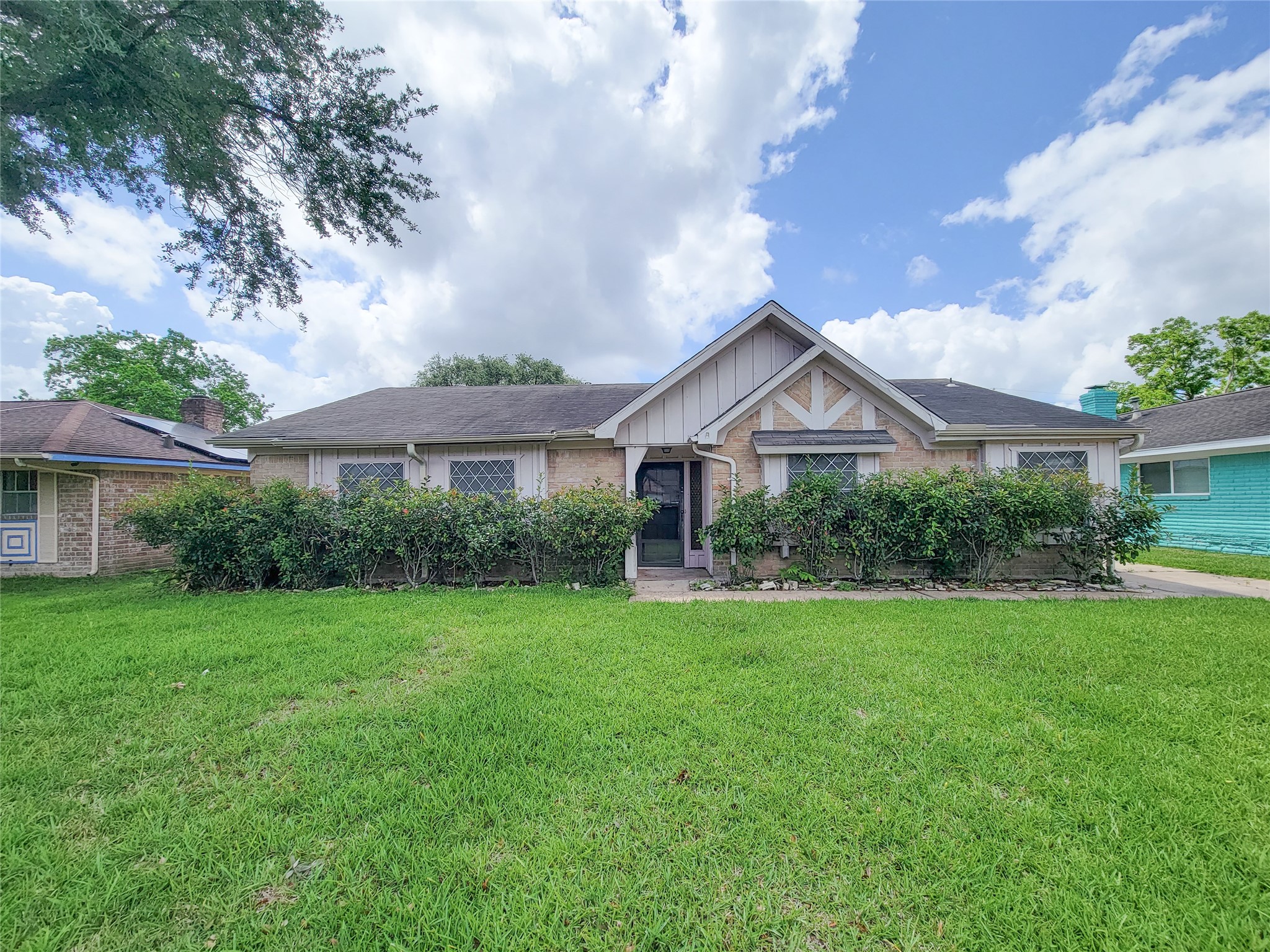 12215 Pompano Lane Houston, TX 77072 - Photo 1 of 44 a view of a big yard in front of house