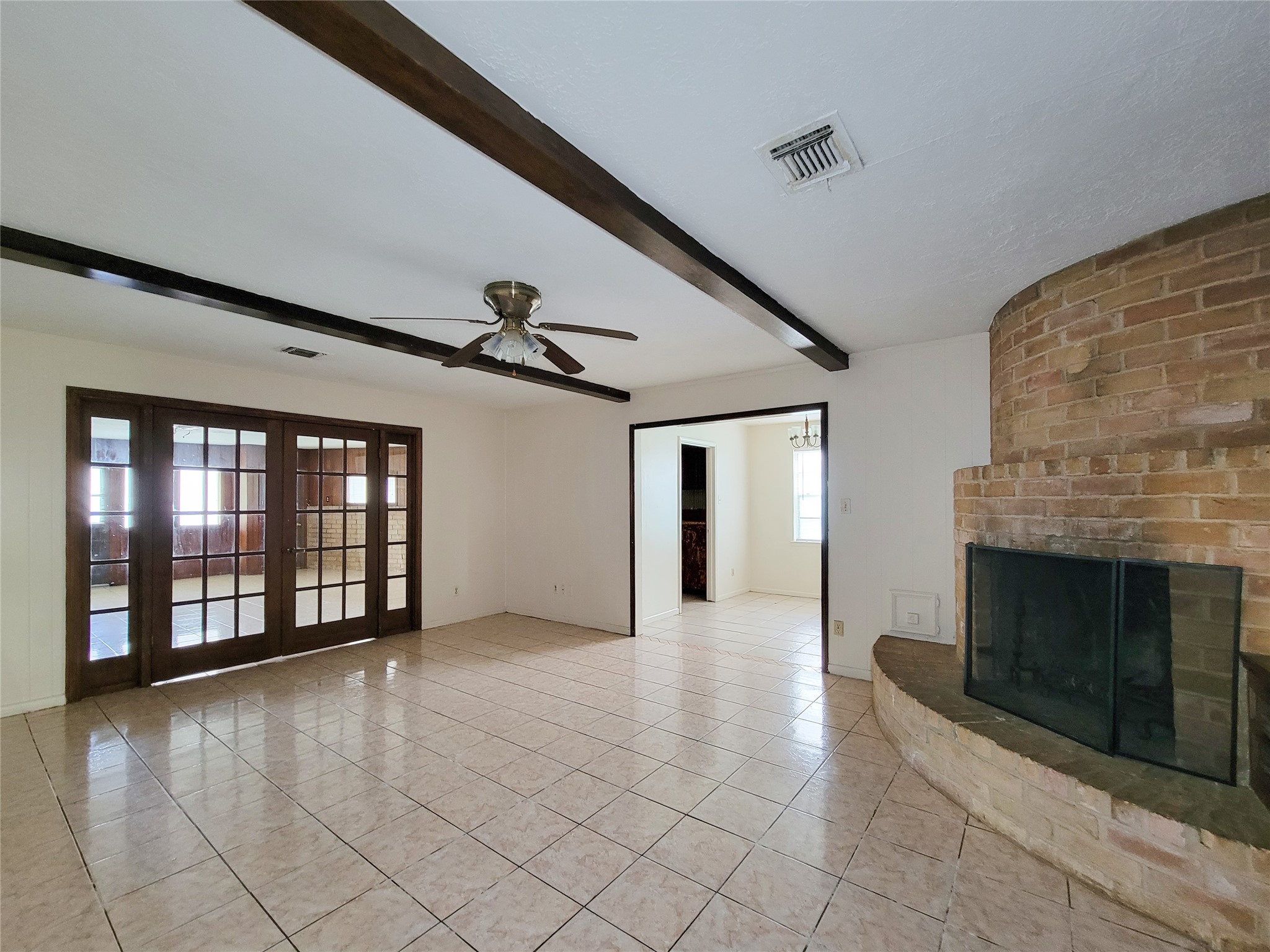 12215 Pompano Lane Houston, TX 77072 - Photo 14 of 44 an empty room with windows and fireplace