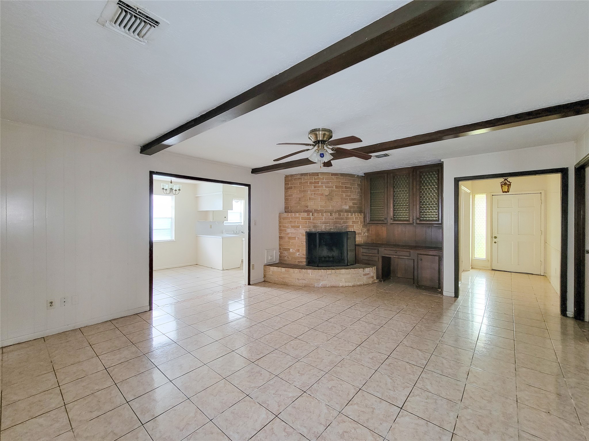 12215 Pompano Lane Houston, TX 77072 - Photo 15 of 44 a view of empty room with wooden floor and fireplace