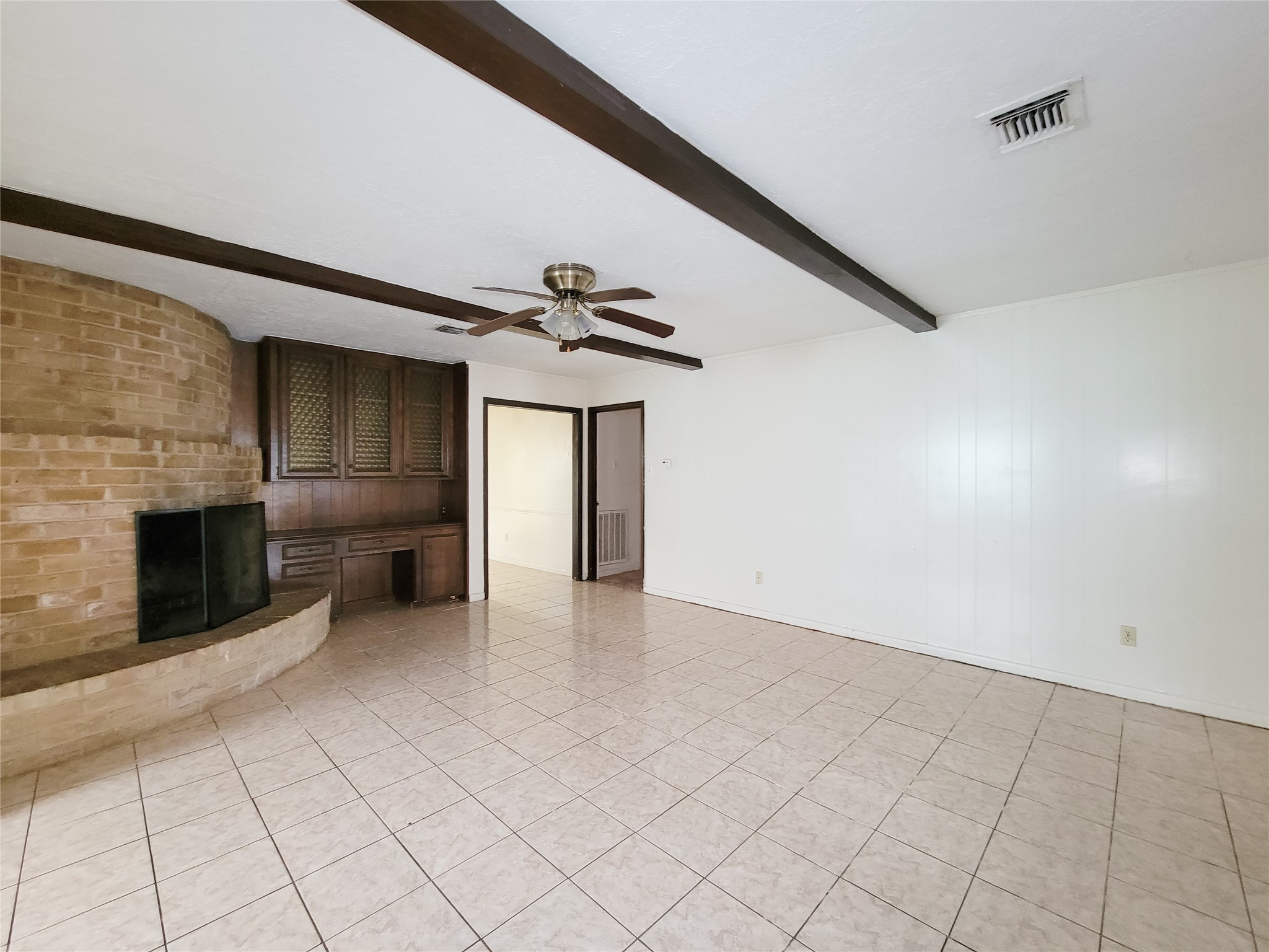 12215 Pompano Lane Houston, TX 77072 - Photo 17 of 44 a view of an empty room with a fireplace