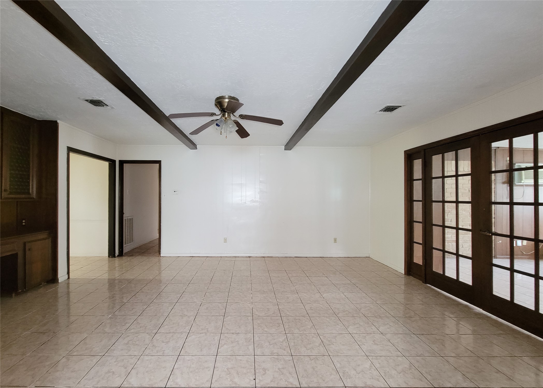 12215 Pompano Lane Houston, TX 77072 - Photo 18 of 44 wooden floor in an empty room with a window