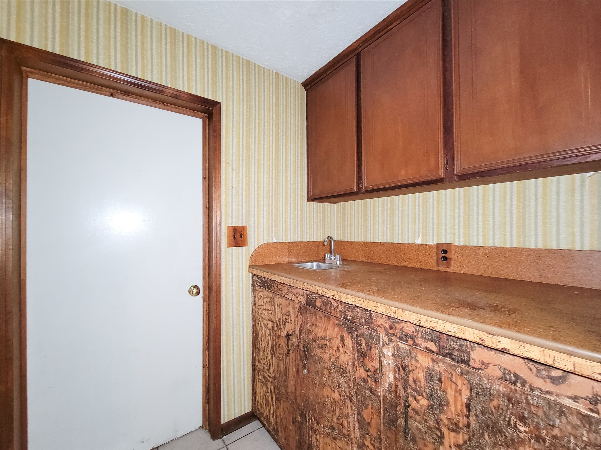 12215 Pompano Lane Houston, TX 77072 - Photo 25 of 44 a kitchen with granite countertop cabinets and sink