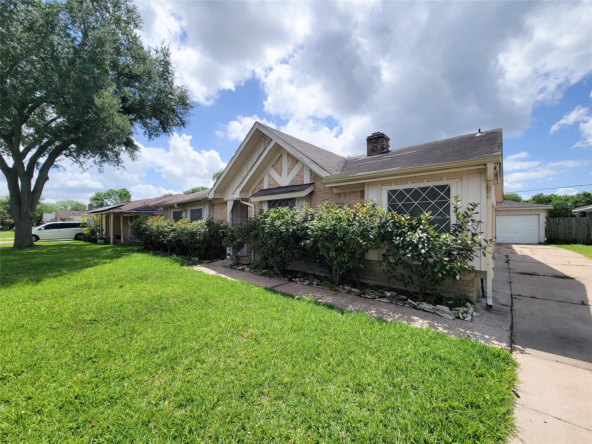 12215 Pompano Lane Houston, TX 77072 - Photo 3 of 44 a front view of a house with a garden
