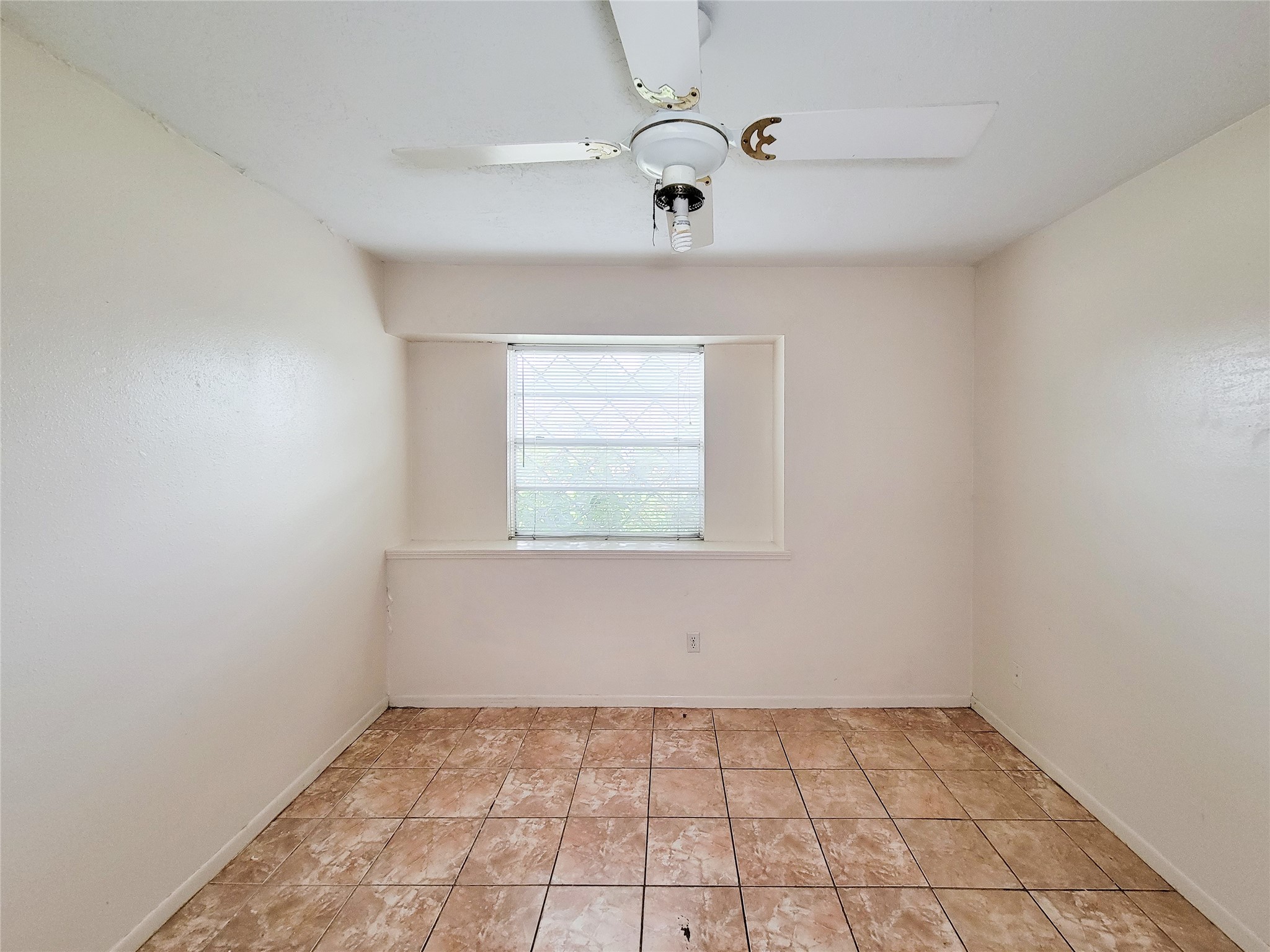 12215 Pompano Lane Houston, TX 77072 - Photo 31 of 44 a view of an empty room with a window
