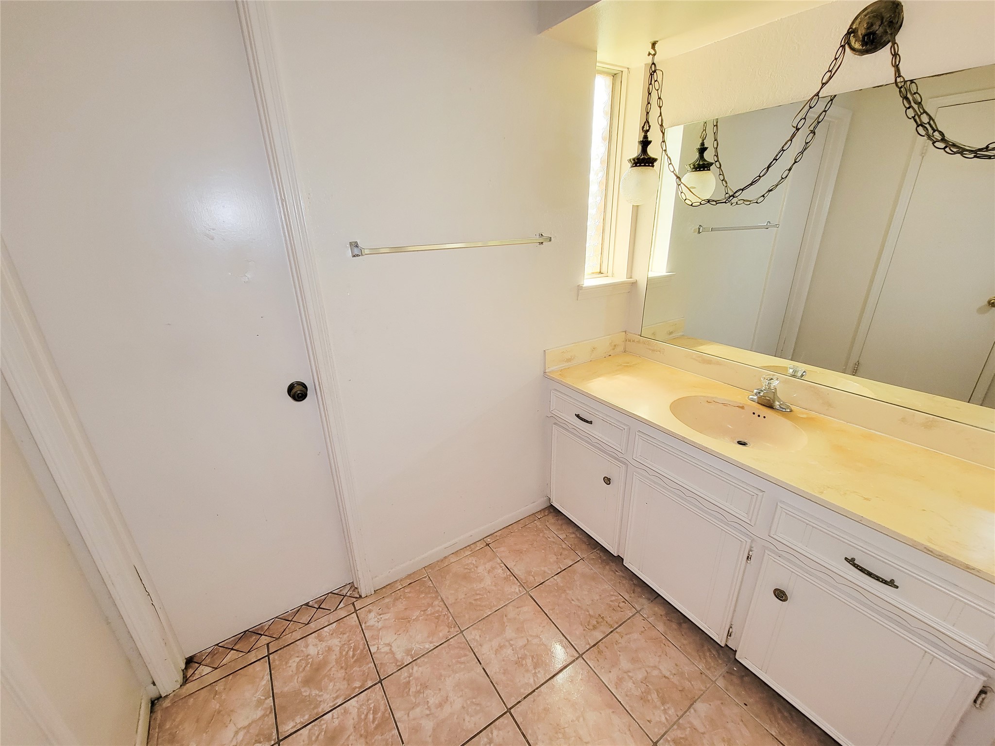 12215 Pompano Lane Houston, TX 77072 - Photo 40 of 44 a spacious bathroom with a granite countertop sink and a mirror