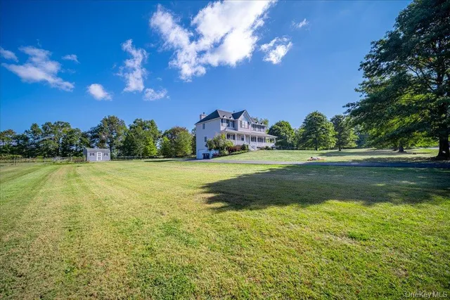 a view of a golf course with a yard