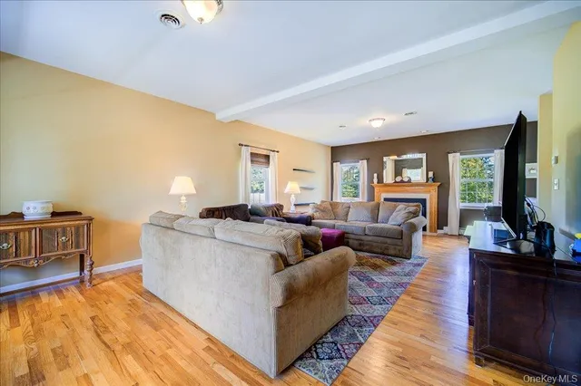 a living room with furniture and a table
