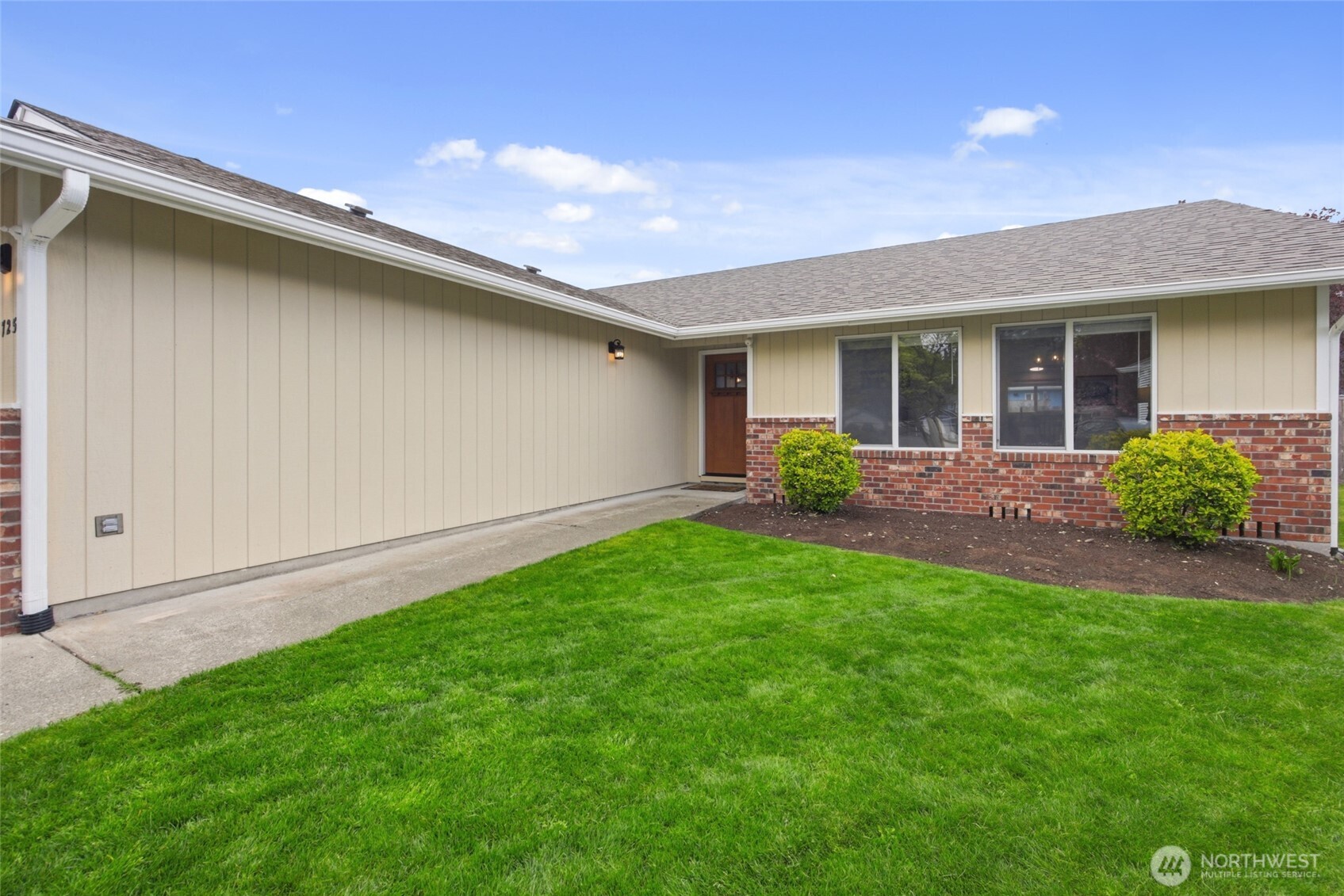5725 58th Court Southeast Lacey, WA 98513 - Photo 5 of 36 a view of a house with a garden