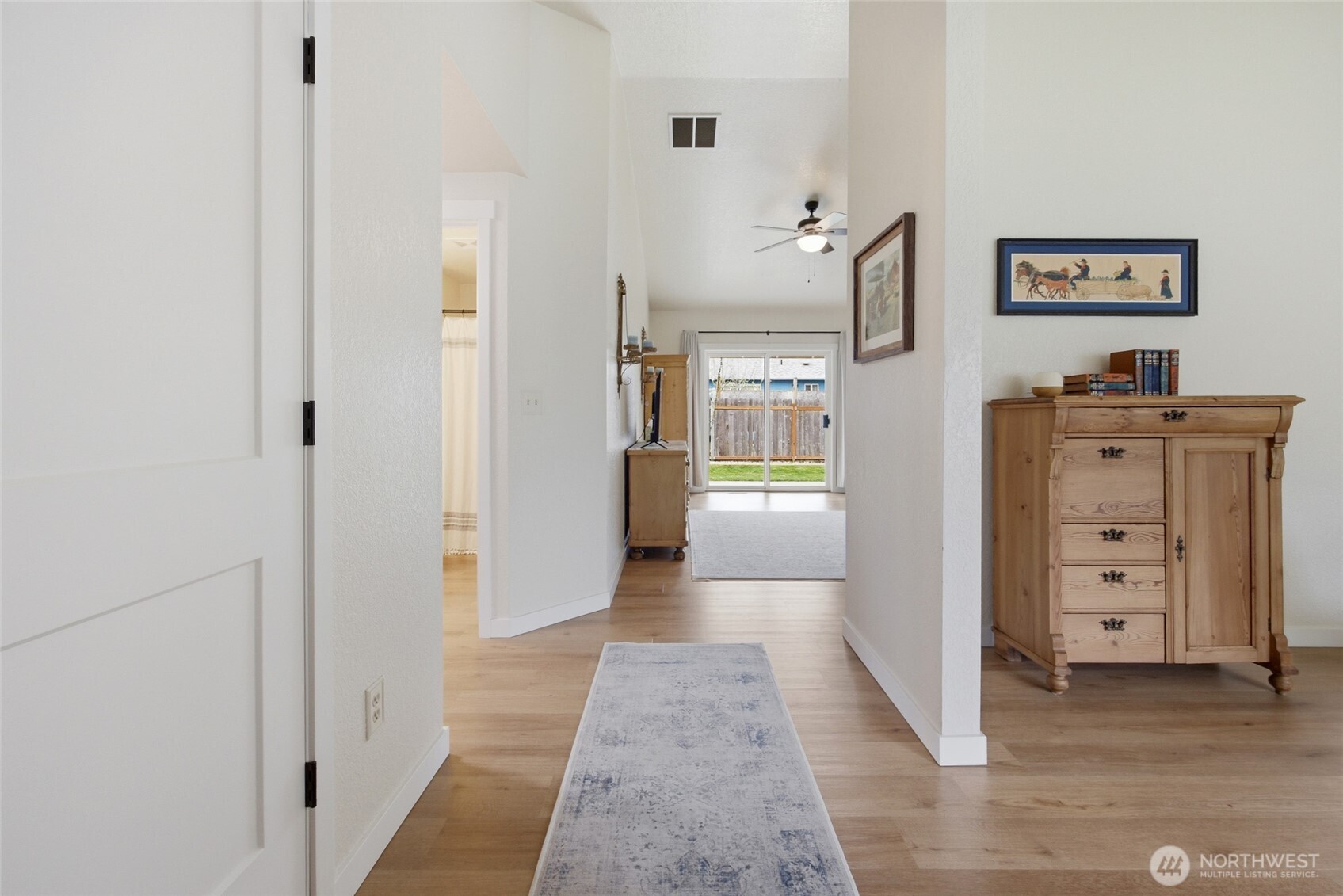 5725 58th Court Southeast Lacey, WA 98513 - Photo 6 of 36 a view of a hallway with cabinet and cabinet