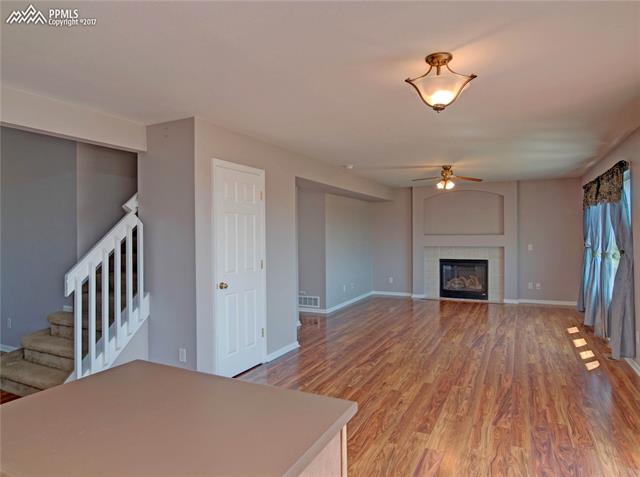 7680 Tompkins Road Peyton, CO 80831 - Photo 13 of 30 View of Family Room from Kitchen. Notice the pantry