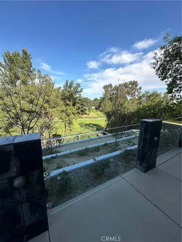 a view of a yard with an outdoor space