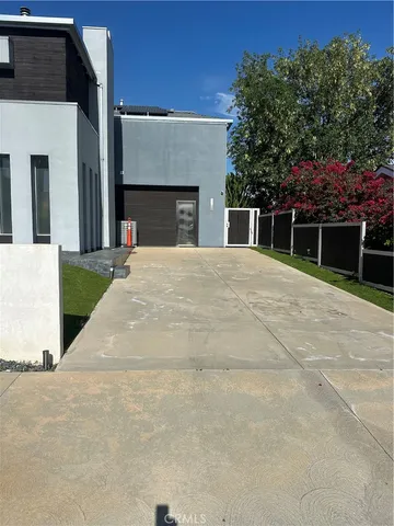 a house with trees in front of it