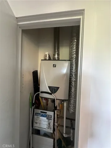 a view of bathroom with mirror