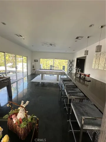 a room with furniture and a flat screen tv