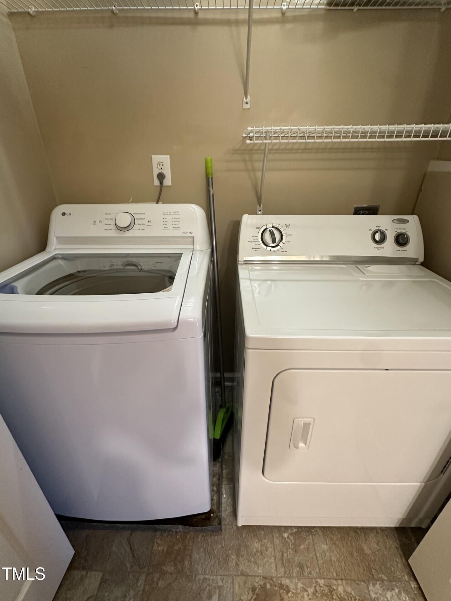 710 North Person Street, Unit 103 Raleigh, NC 27604 - Photo 12 of 16 a utility room with dryer and washer