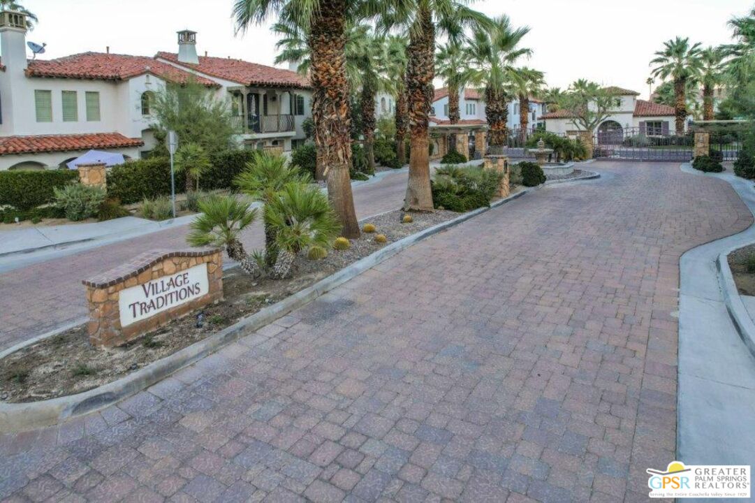 435 Copper Canyon Road, Unit 23 Palm Springs, CA 92262 - Photo 28 of 28 a view of a street with a building in the background