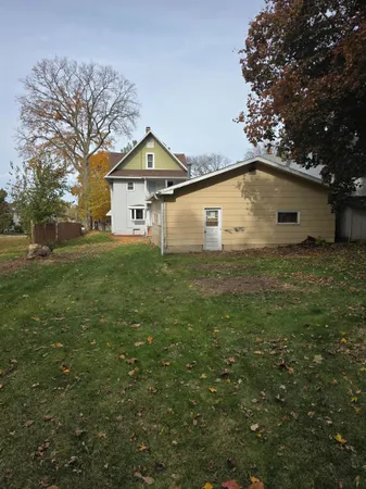 a bathroom with a sink and a yard