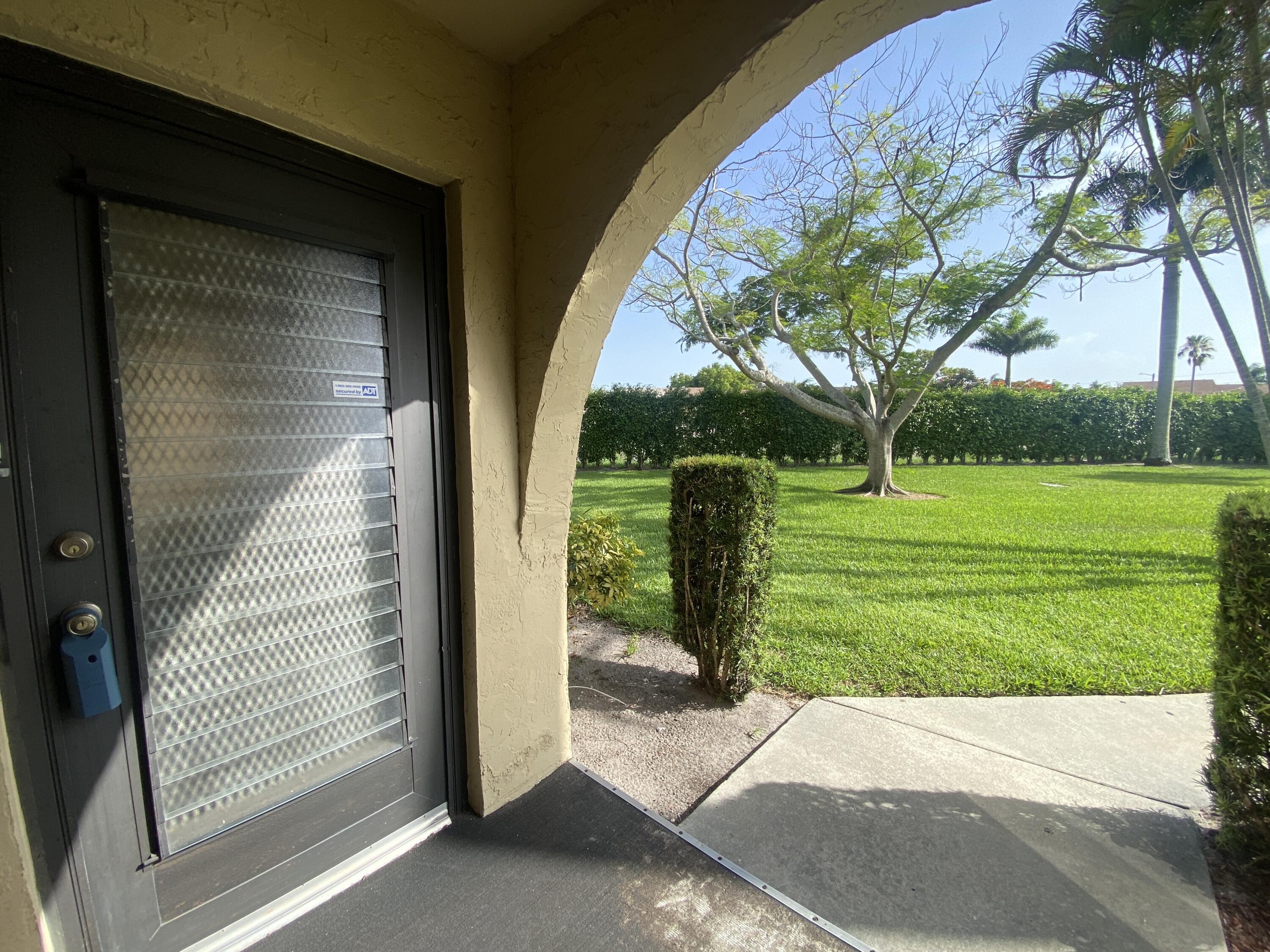 302 Pine Ridge Circle, Unit D1 Greenacres, FL 33463 - Photo 4 of 46