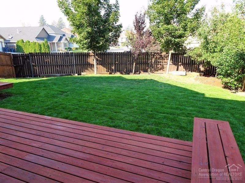 61075 Parrell Road Bend, OR 97702 - Photo 3 of 25 Refinished decks and fully fenced yard.