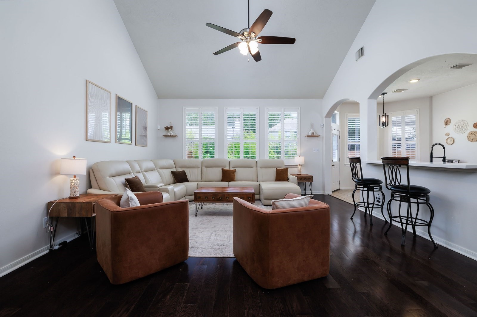 19 East Popular Pine Northeast Conroe, TX 77302 - Photo 9 of 20 a living room with furniture wooden floor and a window
