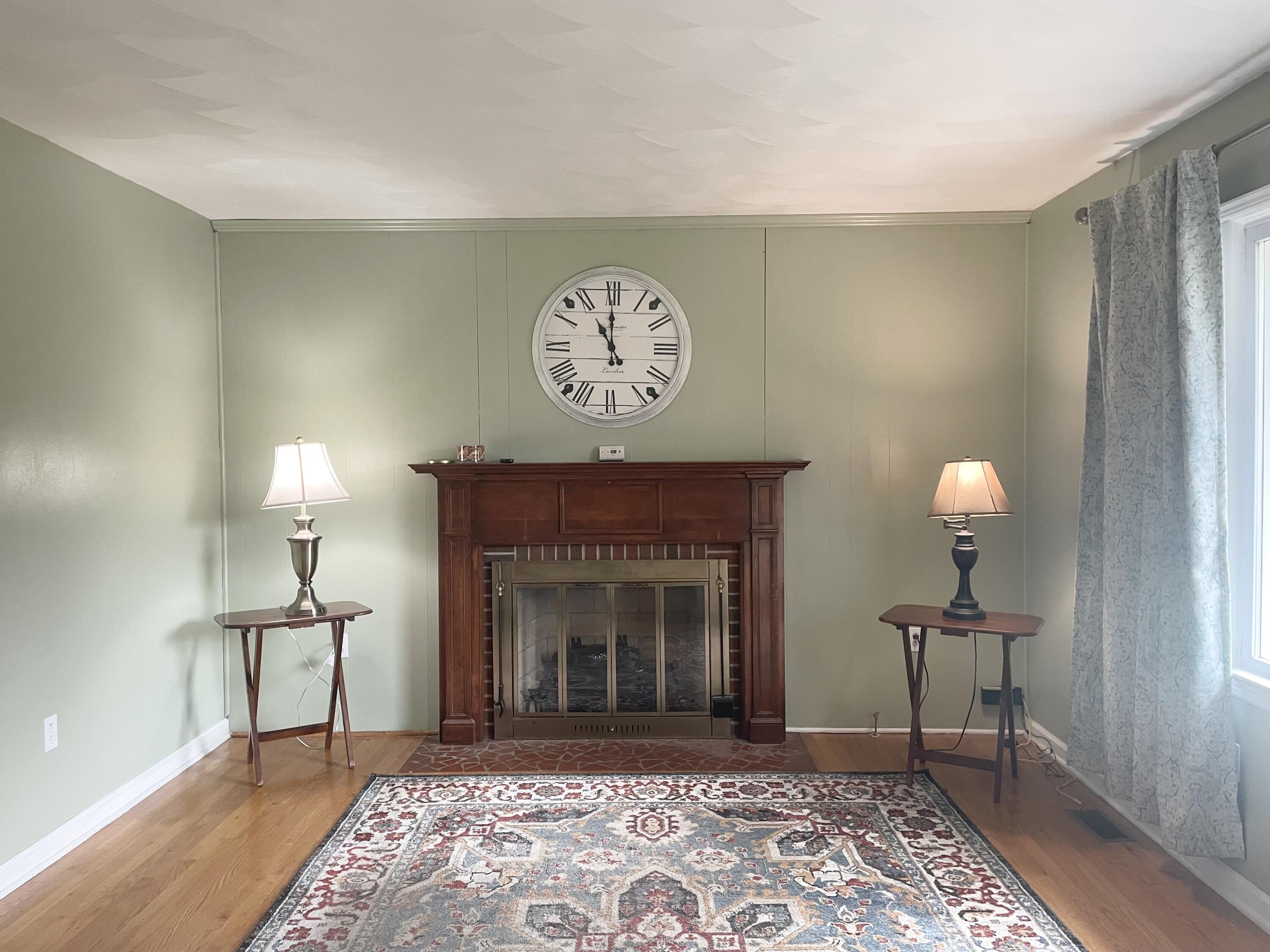 7592 Willow Branch Road Boones Mill, VA 24065 - Photo 2 of 47 a view of a livingroom with furniture and a fireplace