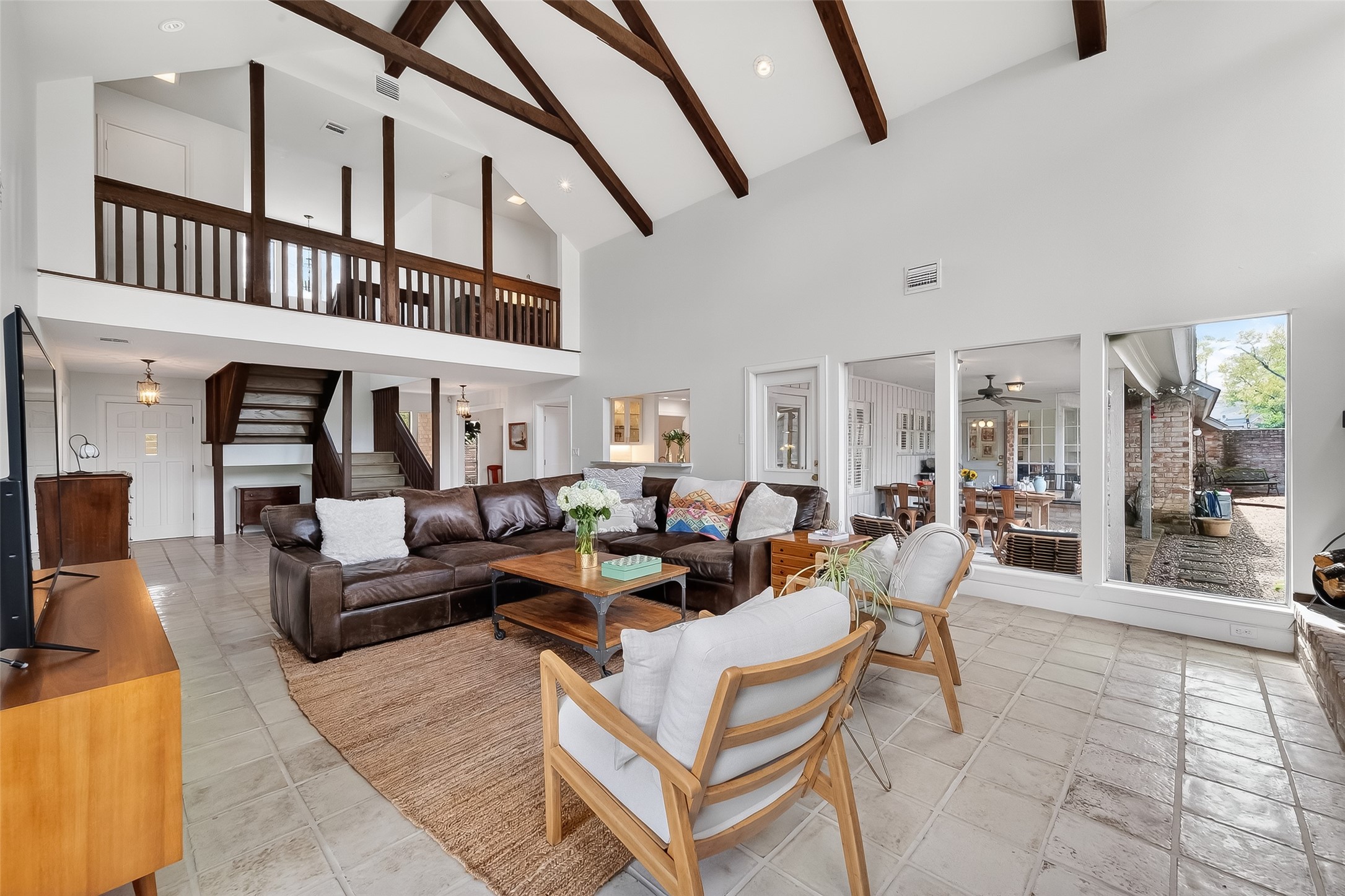 10022 Bayou Glen Road Houston, TX 77042 - Photo 1 of 43 Front entry opens up into a large vaulted ceiling family room