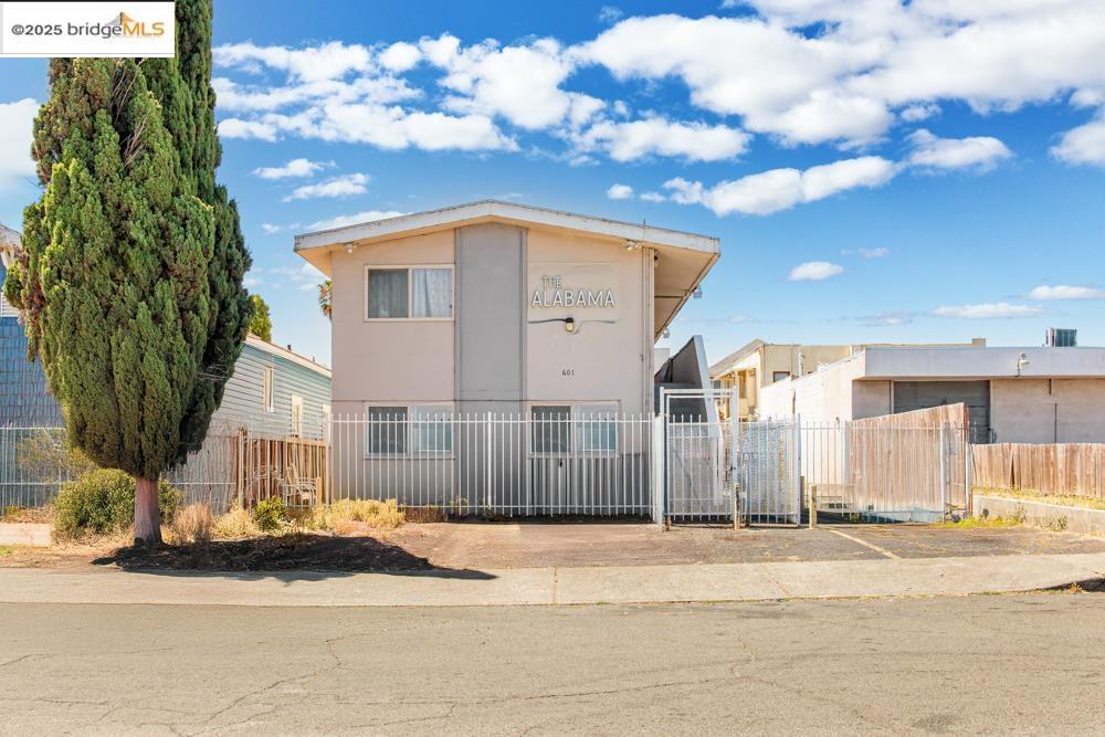 601 Alabama Street Vallejo, CA 94590 - Photo 1 of 17 a front view of a house with a yard and garage