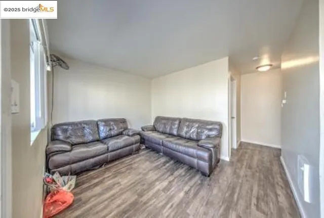 a kitchen with granite countertop a stove and a sink