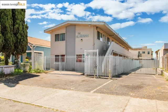a front view of a house with a garage