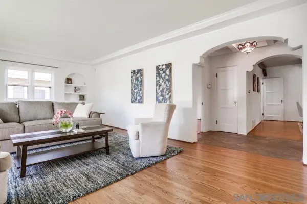 a kitchen with stainless steel appliances granite countertop a refrigerator stove microwave and cabinets