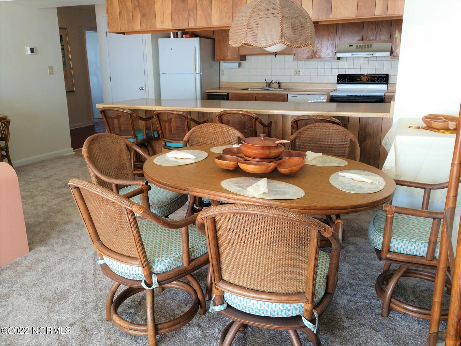 855 Salter Path Road, Unit 325 Atlantic Beach, NC 28512 - Photo 6 of 16 325 Colony dining area