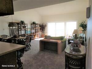 855 Salter Path Road, Unit 325 Atlantic Beach, NC 28512 - Photo 8 of 16 325 Colony freat room view from kitchen