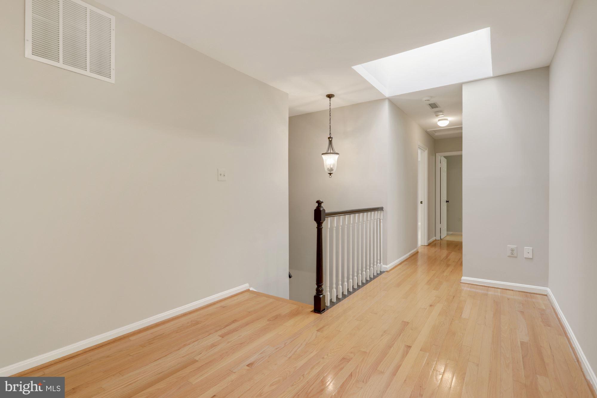 737 Ridge Drive McLean, VA 22101 - Photo 22 of 41 Upper level with skylight
