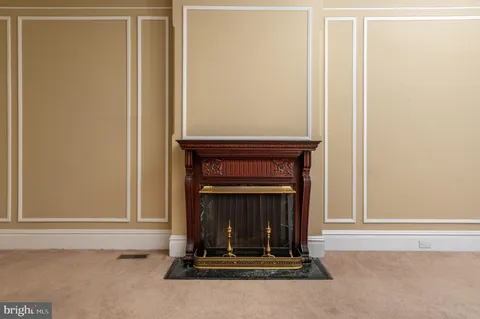 a living room with a fireplace