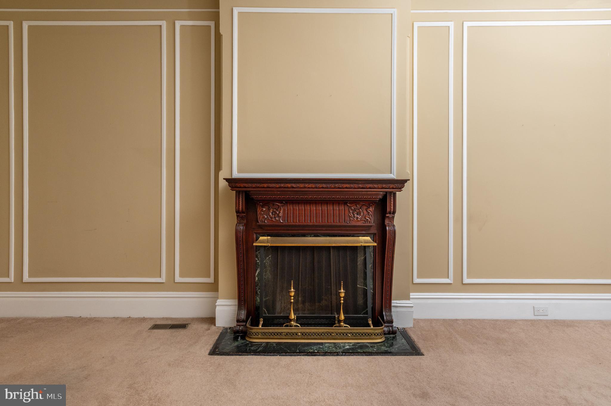 2232 Massachusetts Avenue Northwest Washington, DC 20008 - Photo 15 of 21 a living room with a fireplace