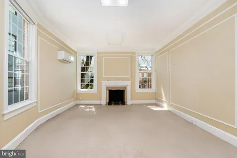 a view of a backyard with sitting area and furniture