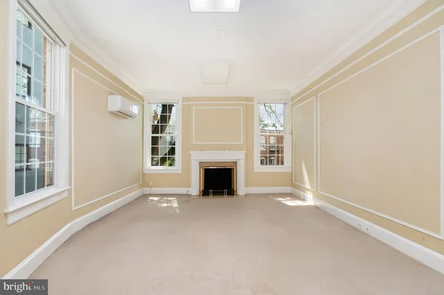 a view of a backyard with sitting area and furniture