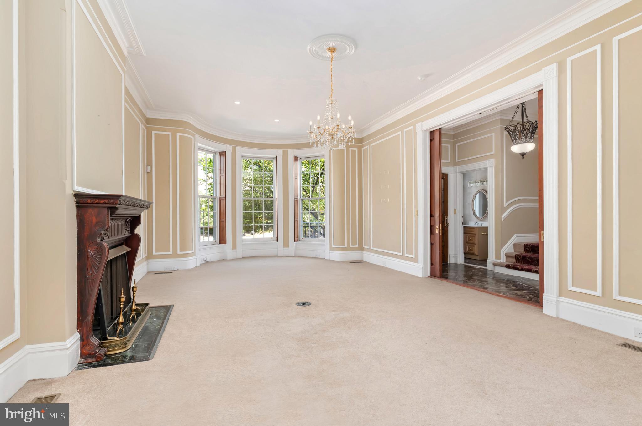 2232 Massachusetts Avenue Northwest Washington, DC 20008 - Photo 5 of 21 an entryway with fireplace and windows