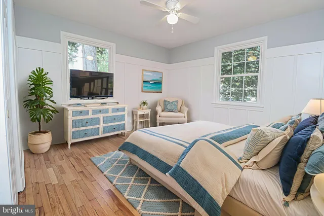 a bathroom with a sink and a window