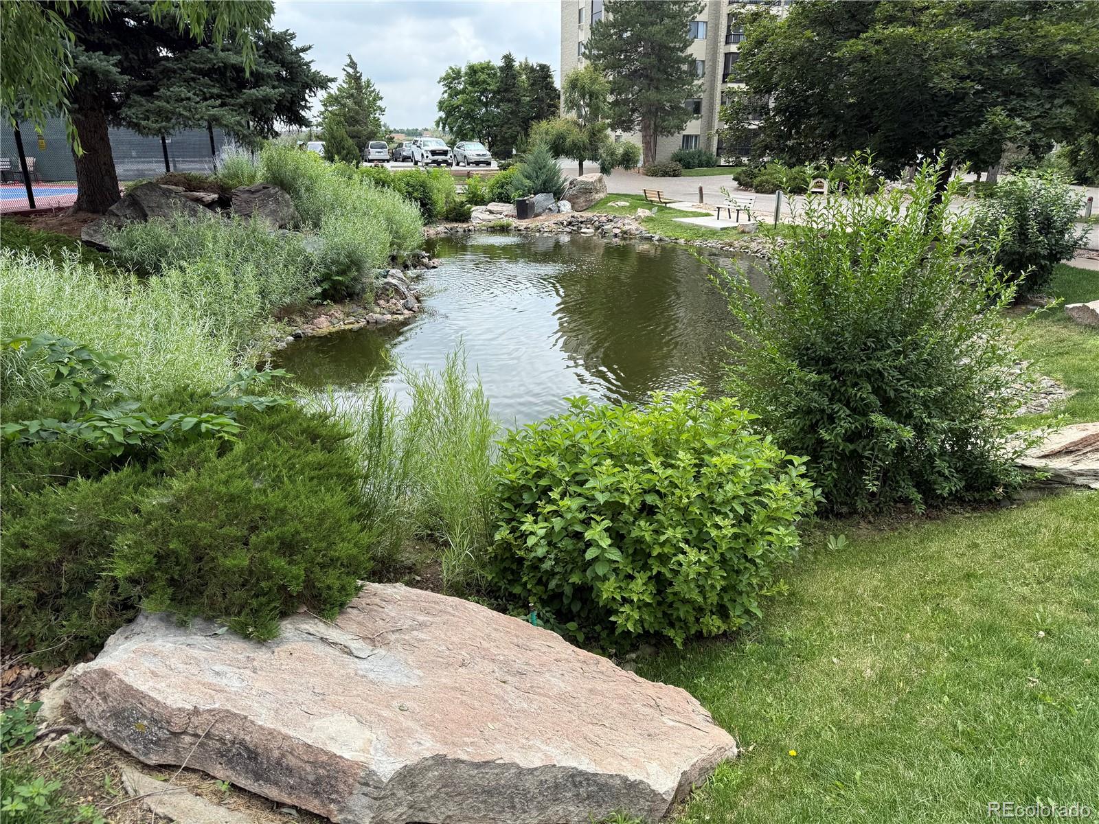 13890 East Marina Drive, Unit 602 Aurora, CO 80014 - Photo 22 of 27 a view of lake background with houses