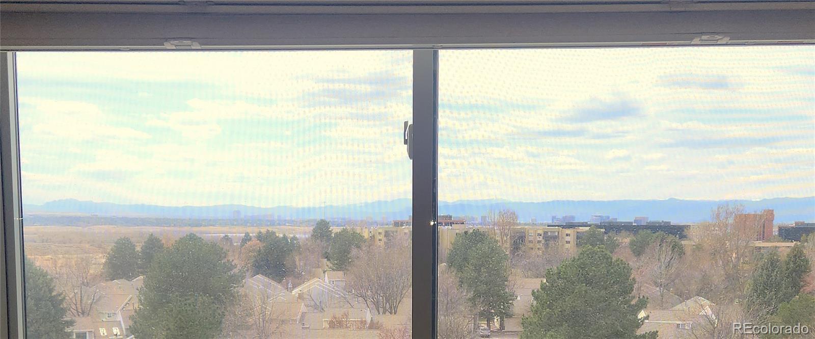 13890 East Marina Drive, Unit 602 Aurora, CO 80014 - Photo 7 of 27 a view of a lake from a balcony