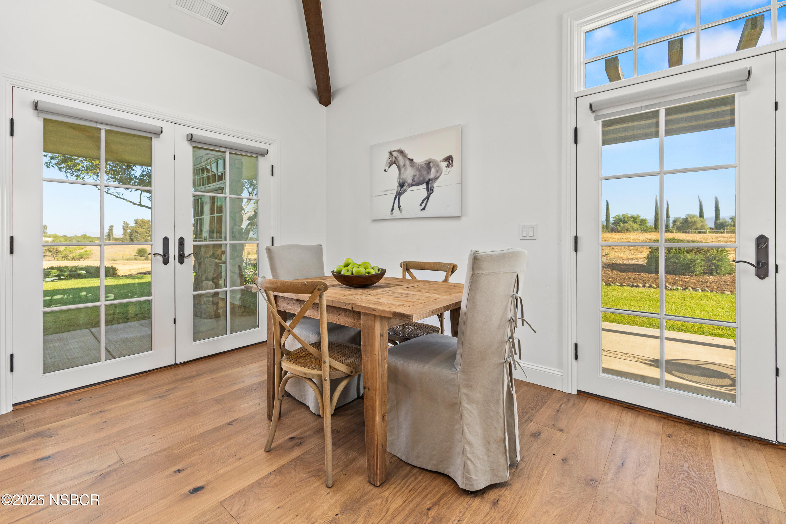 1740 Still Meadow Road Solvang, CA 93463 - Photo 11 of 43 a view of a dining room with furniture and wooden floor