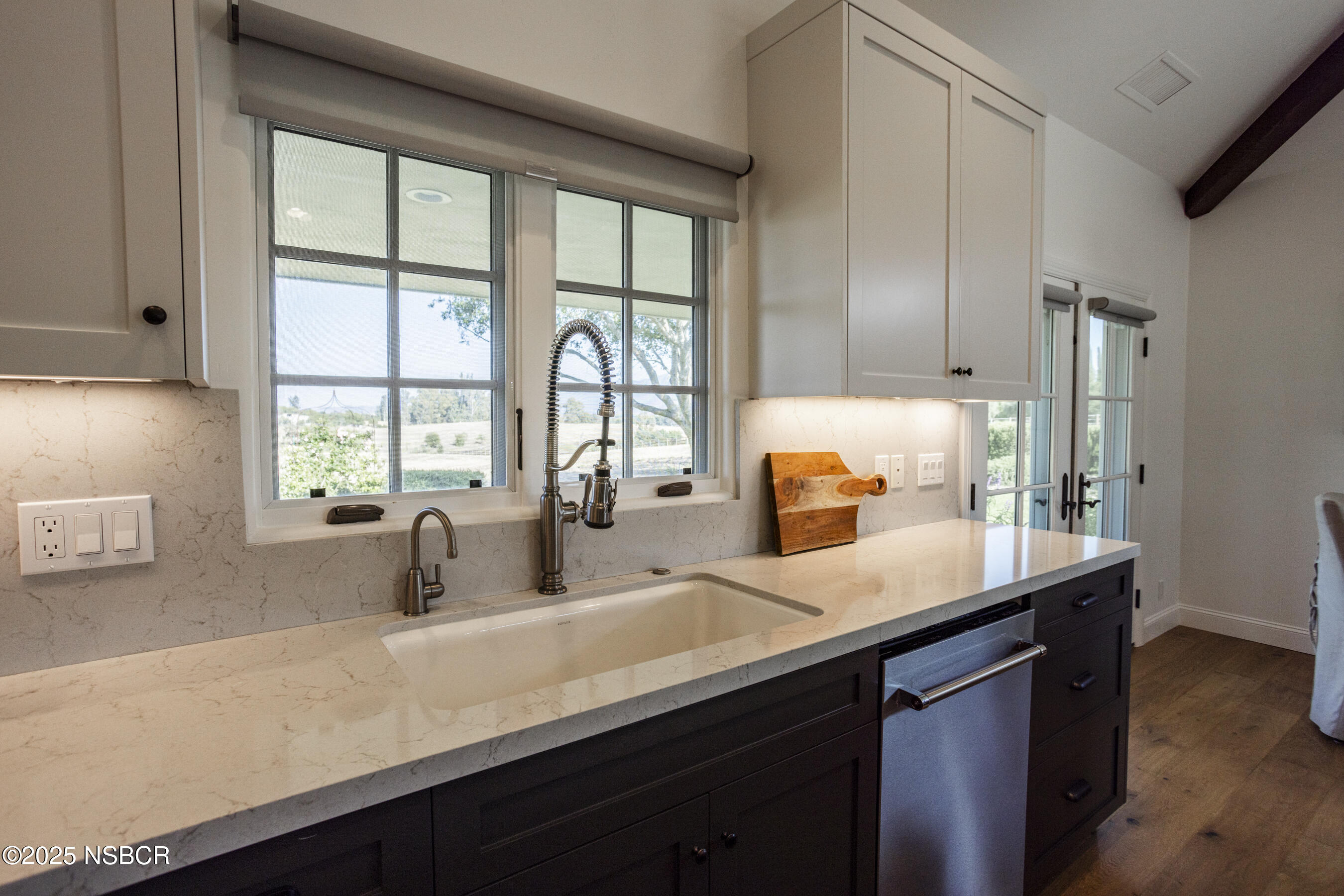 1740 Still Meadow Road Solvang, CA 93463 - Photo 15 of 43 a kitchen with a sink and large window