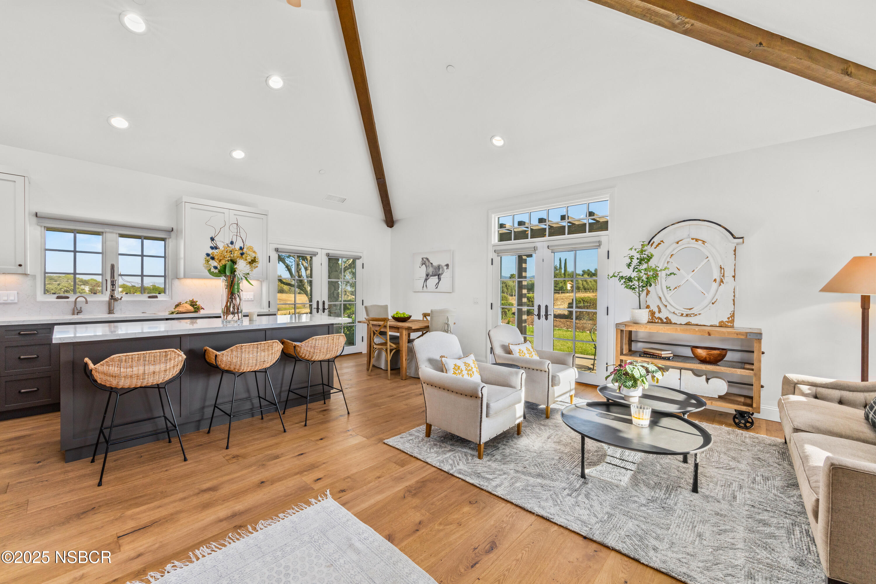 1740 Still Meadow Road Solvang, CA 93463 - Photo 16 of 43 a living room with furniture a rug and a table